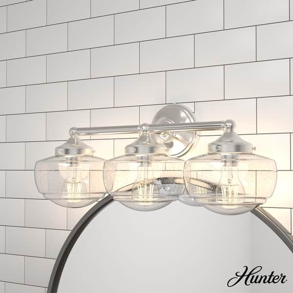 slide 2 of 10, Hunter Saddle Creek Vanity Wall Light - Transitional, Vintage Schoolhouse - Damp Rated! 3- Light - Brushed Nickel -Clear Seeded Glass