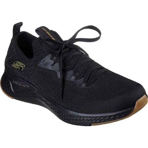 skechers shoes mens gold