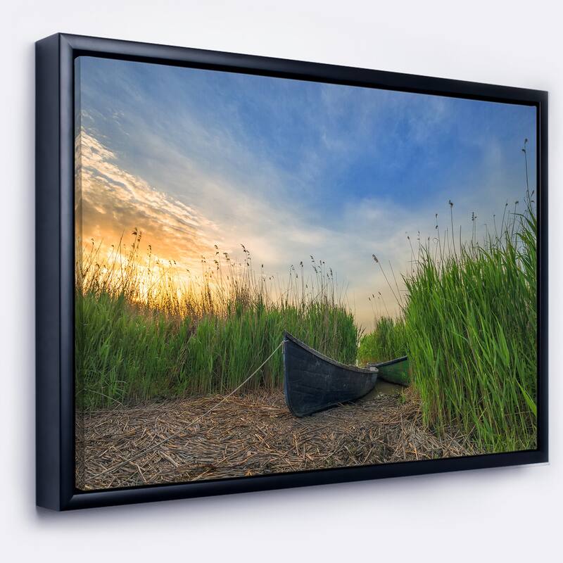 Designart "Old Fisher Boat Near Lake" Landscape Photography Framed Canvas Print - 40 in. wide x 30 in. high - Black