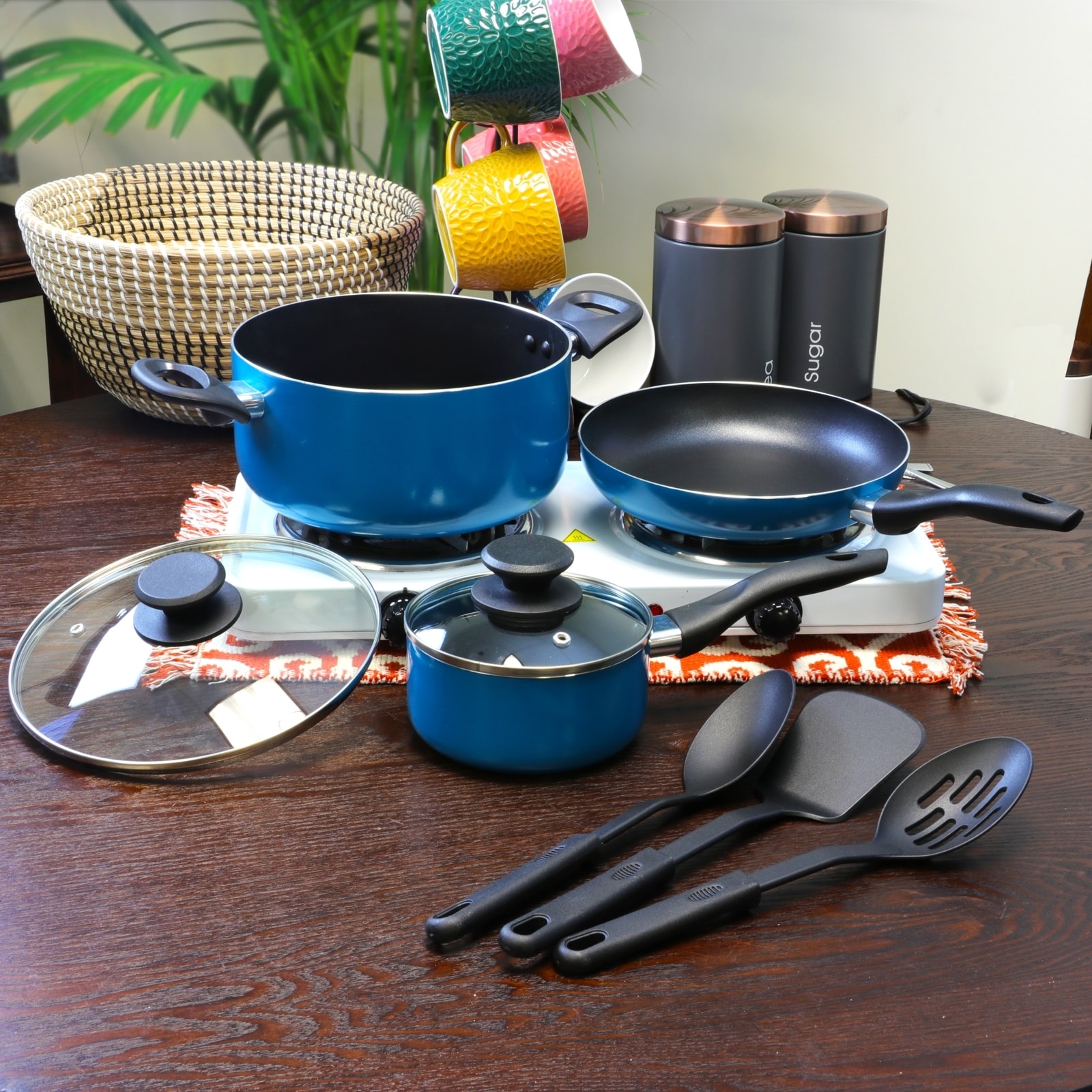 https://ak1.ostkcdn.com/images/products/is/images/direct/81352bdc7b0f1c7b244f0850d73692ea0b922c3d/Gibson-Palmer-8pc-Cookware-Set-in-Turquoise.jpg
