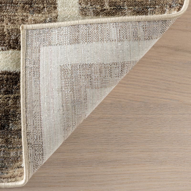 Olvera Geometric Bordered Area Rug