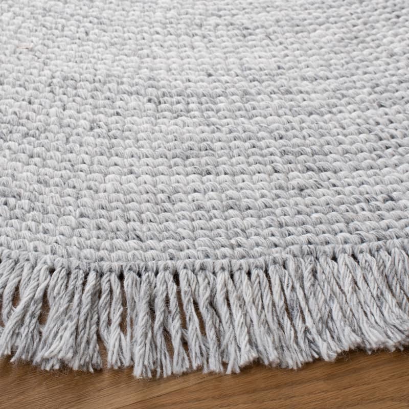 SAFAVIEH Handmade Braided Pelagia Fringe Round Rug