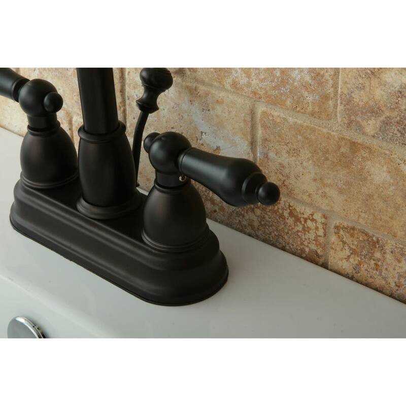 Kingston Brass Restoration Centerset Bathroom Faucet with Pop-Up Drain