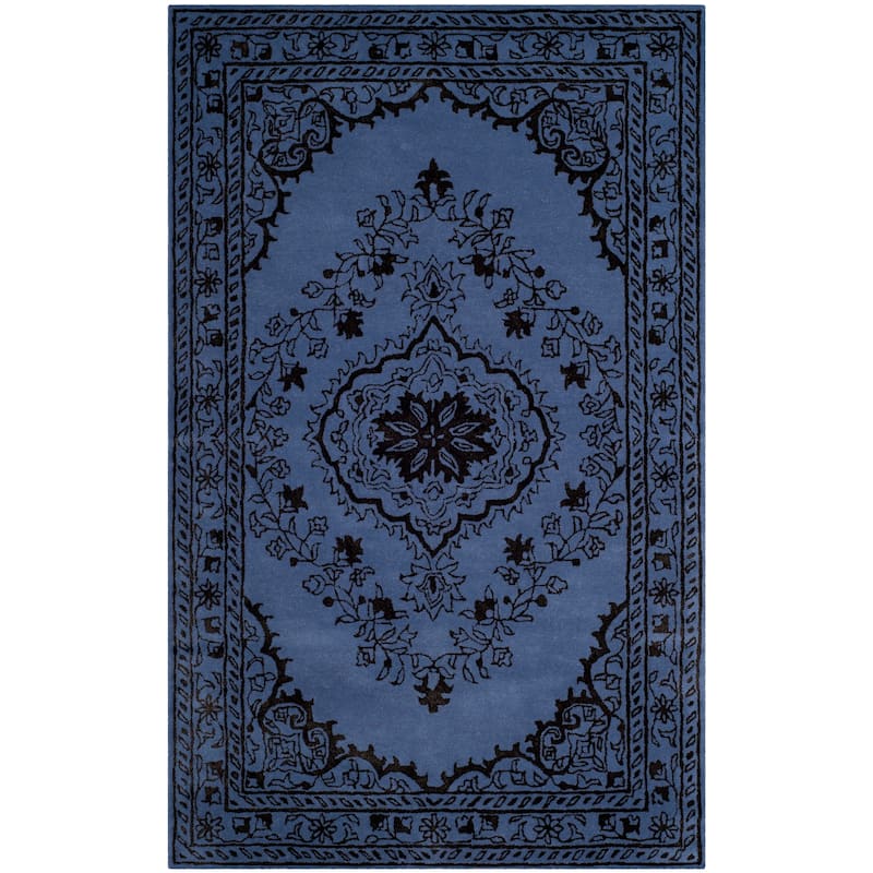 SAFAVIEH Handmade Glamour Gudmundina Modern Viscose Rug