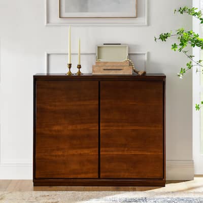 Walnut-Colored Cabinet with Outlet Holes - Practical Storage for Living Room & Bedroom.