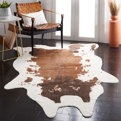 SAFAVIEH Faux Cow Hide Stacey Animal Rug
