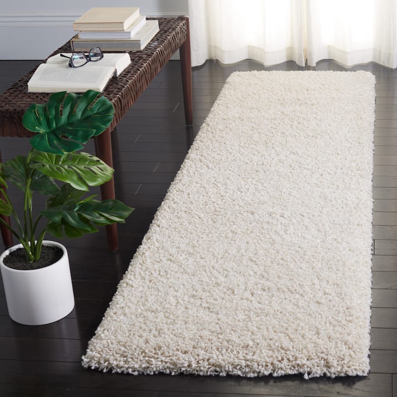 SAFAVIEH Evolution Shag Gwenaele Solid 1.8-inch Thick Rug - 2'2" x 8' Runner - Ivory - Runner