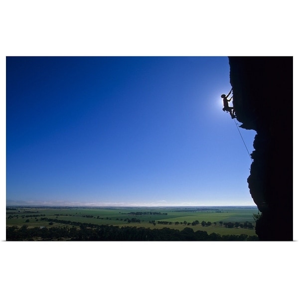 "Silhouette of man rock climbing" Poster Print