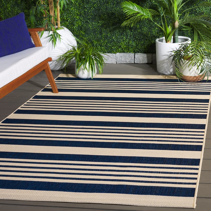 SAFAVIEH Courtyard Orsi Indoor/ Outdoor Waterproof Area Rug - 5'3" x 7'7" - Navy/Beige
