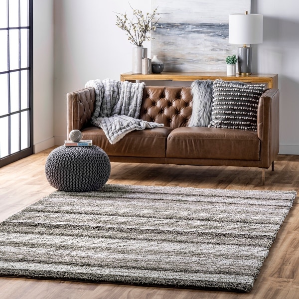 Strick & Bolton Lawrie Handmade Striped Plush Shag Rug. Opens flyout.