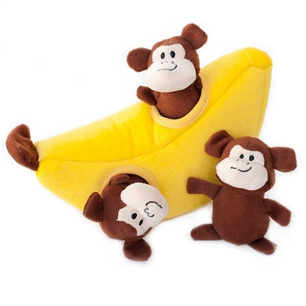 stuffed toy monkey with banana