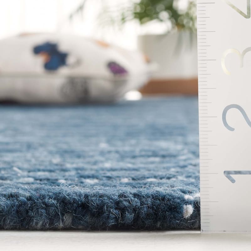SAFAVIEH Hand-Tufted Ebony Eiliv Modern & Contemporary Wool Rug