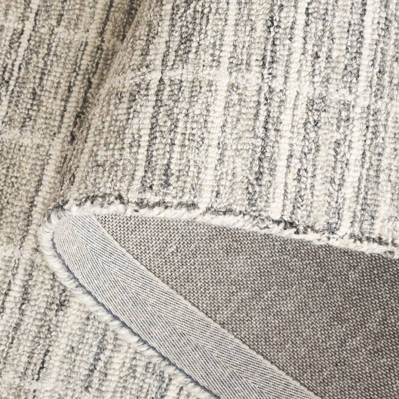 SAFAVIEH Handmade Ebony Peigi Contemporary Wool Rug