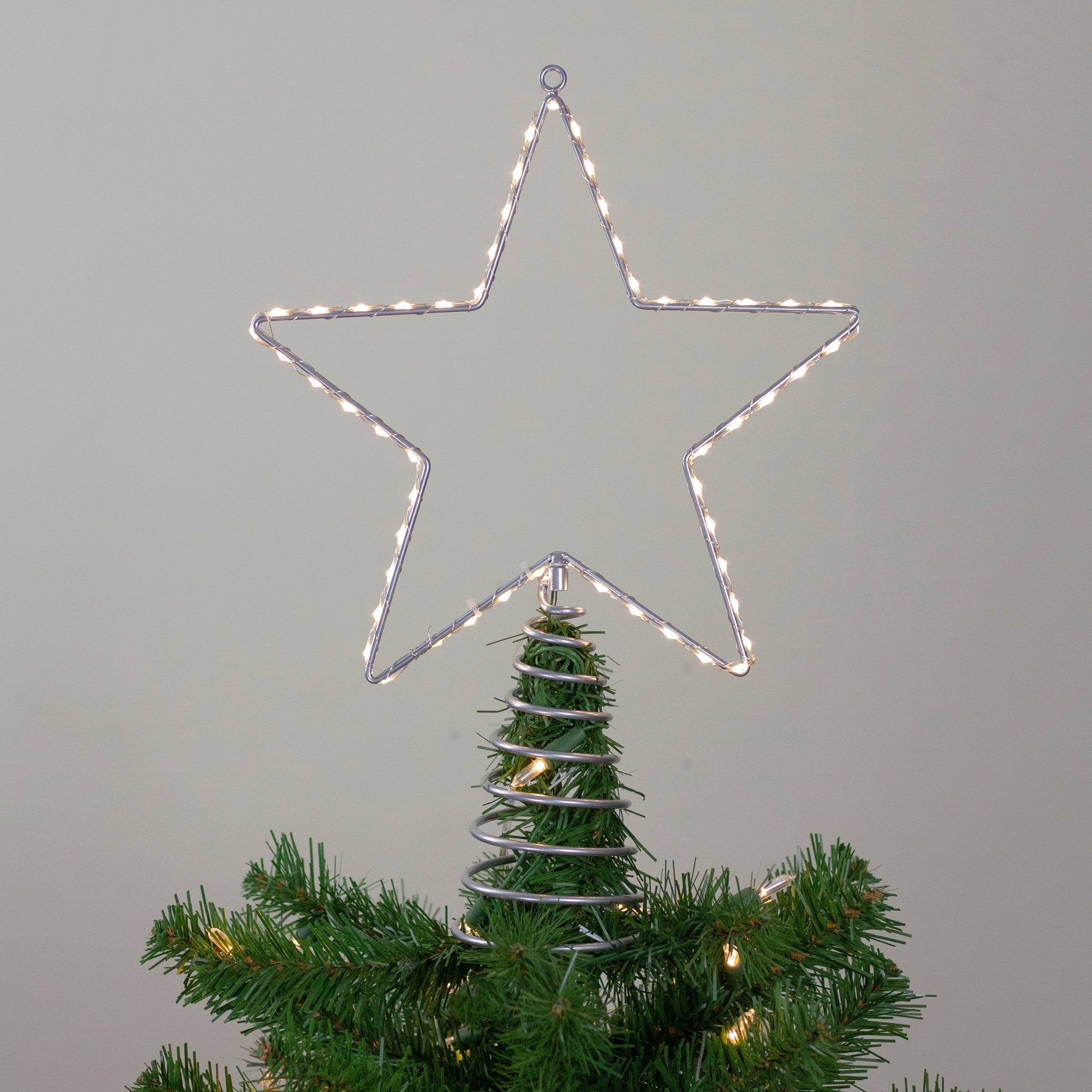 18 Lighted Silver Star Christmas Tree Topper Clear Led Lights Overstock 29782085 This retro classic star tree topper screamsthis retro classic star tree topper screams nostalgia with its gold tinsel border. 18 lighted silver star christmas tree topper clear led lights