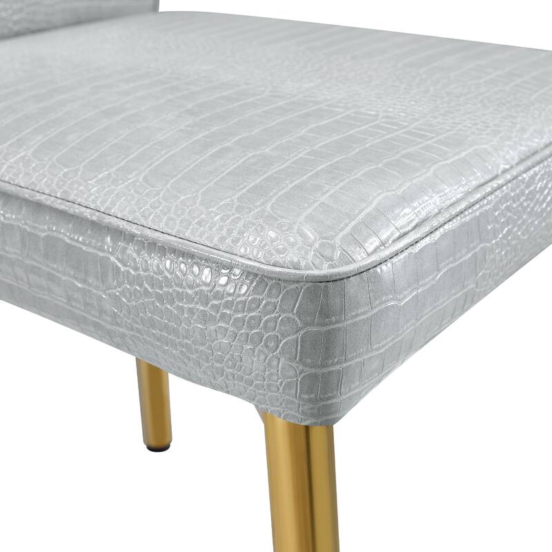 A set of 2 vintage crocodile leather cushioned dining chairs, featuring crystal clasp design and artificial leather design