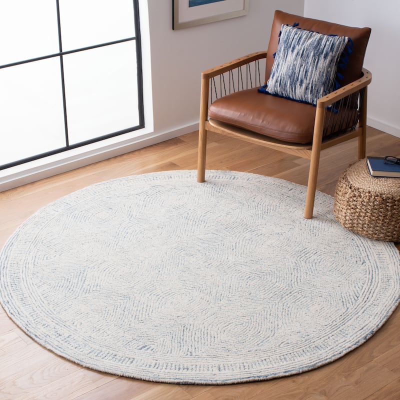 SAFAVIEH Handmade Abstract Leonide Modern Wool Rug - 6' Round - Ivory/Blue