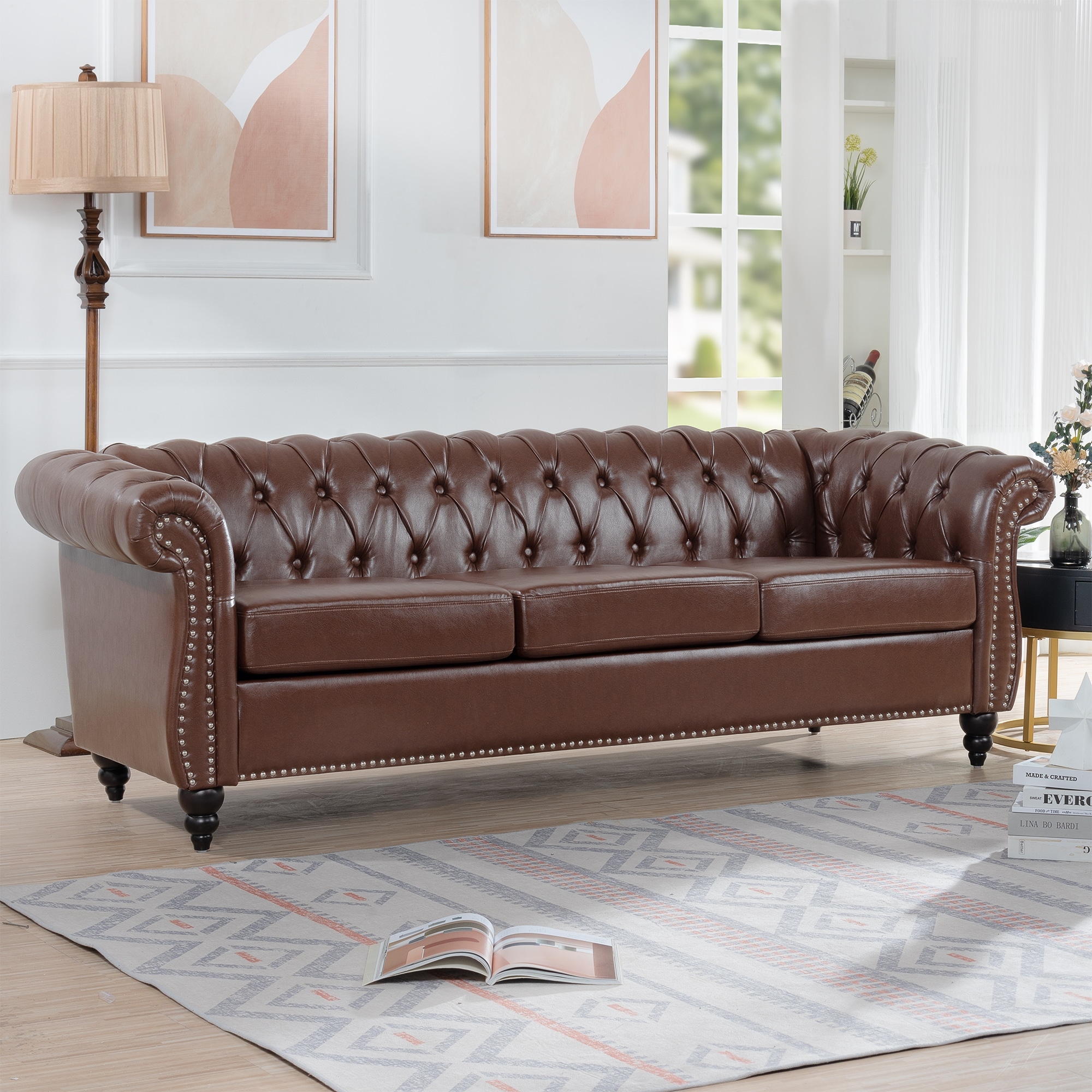Tan leather three seater sofa on sale
