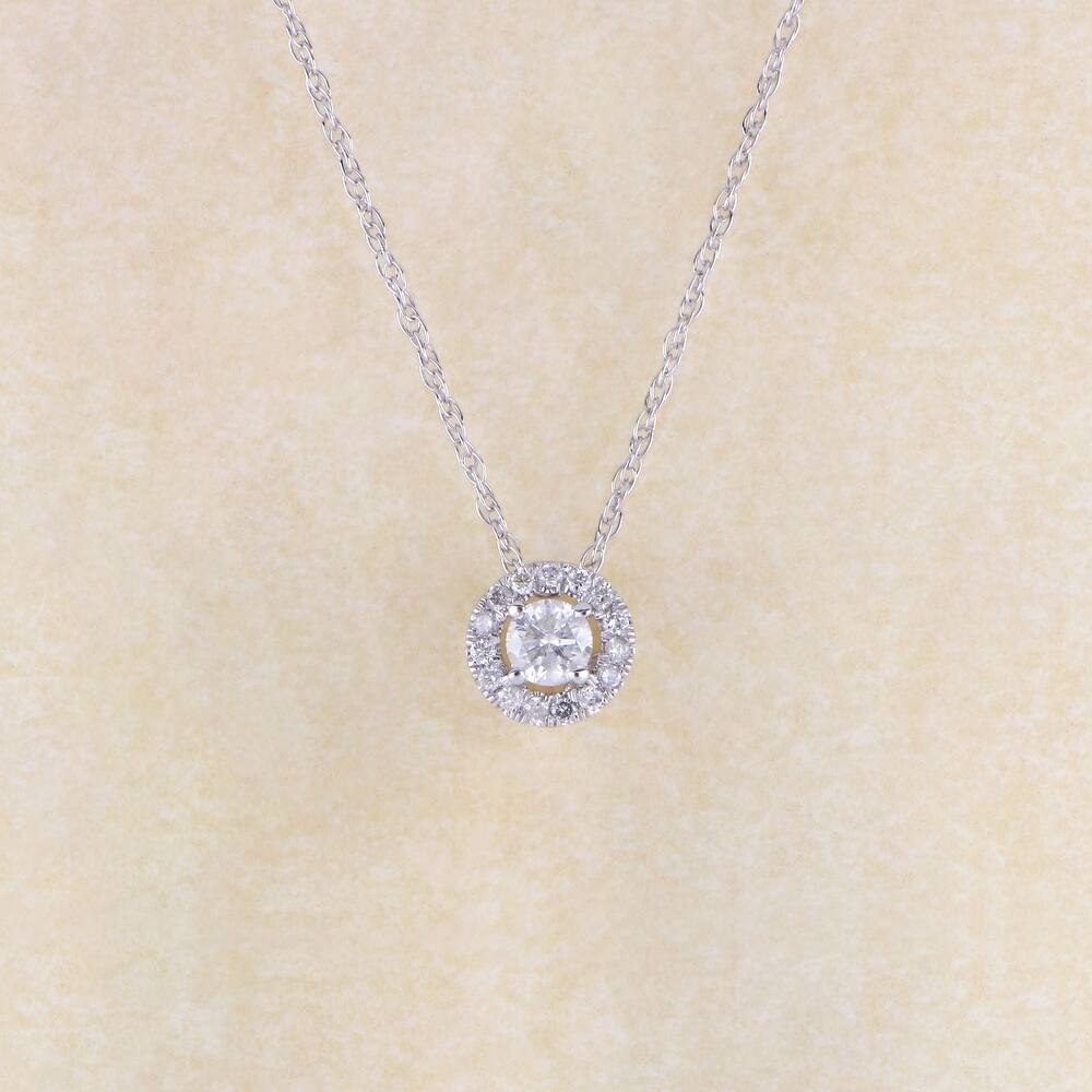 1/6ct TDW Diamond Solitaire Halo Pendant Necklace in 10k Gold for Women