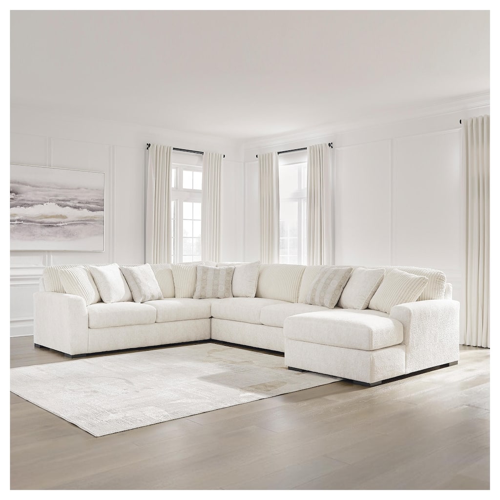 Signature Design by Ashley Chessington Ivory 4-Piece Sectional with Chaise - 152"W x 106"D x 40"H