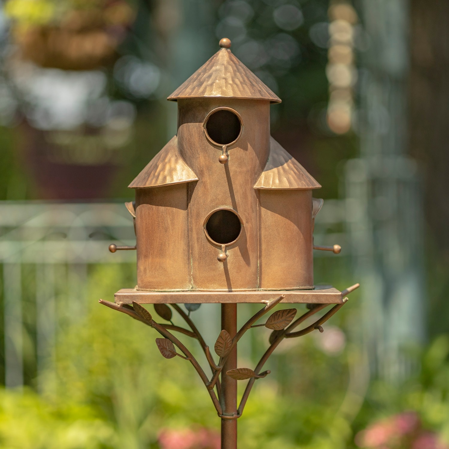 https://ak1.ostkcdn.com/images/products/is/images/direct/82922f18c968a2dc6ff573b5e64ed769d28a0c54/Plump-Cylinder-Triple-Birdhouse-Stake--Copper-Finish.jpg