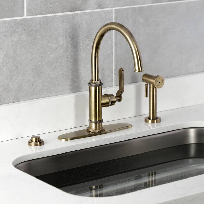 Kingston Brass Whitaker Single-Handle Deck Mount Kitchen Faucet with Brass Sprayer