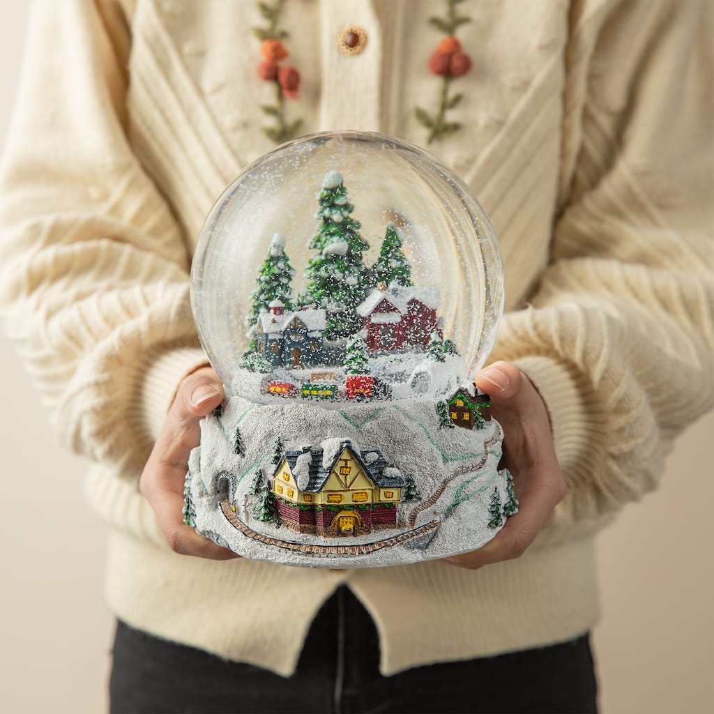 Glitzhome 8"H Oversized Resin Lighted Musical Snowflakes Village Waterglobe