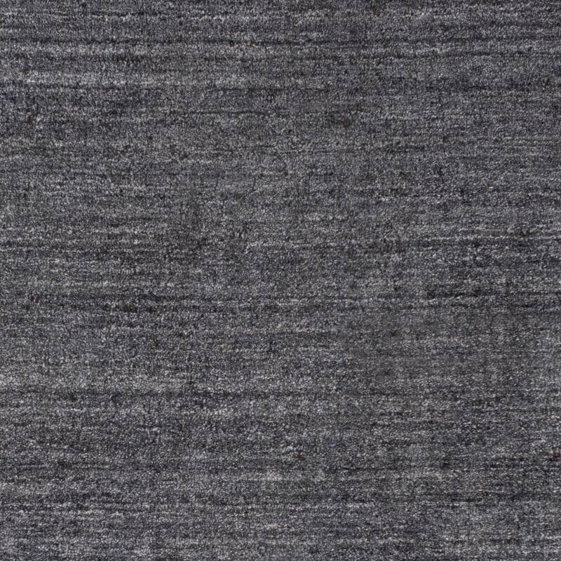 Hand-woven Dan Solid Viscose Area Rug