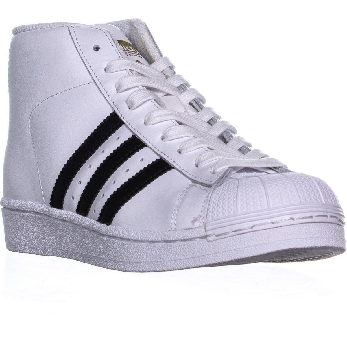 black and gold adidas high tops