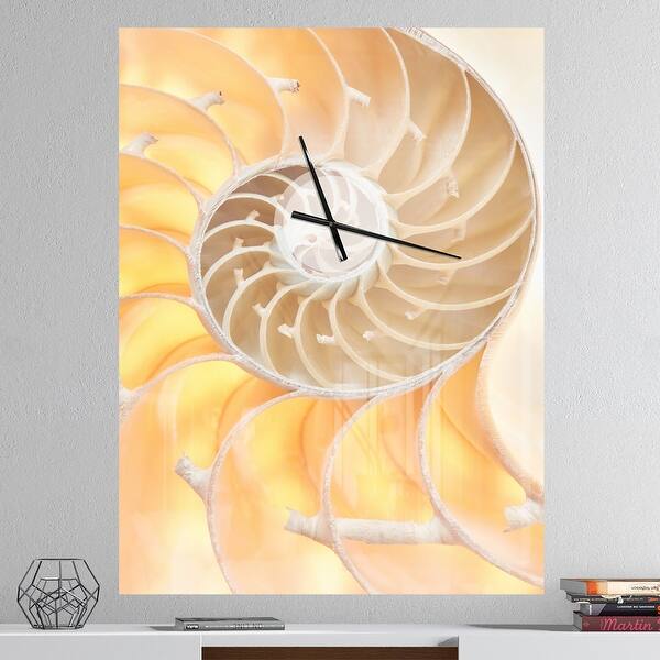 slide 2 of 11, Designart 'Golden Nautilus Shell Pattern' Oversized Coastal Wall CLock