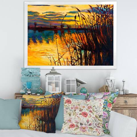 Designart "Yellow Sunset Through The High Grass By The Lake" Nautical & Coastal Framed Art Print
