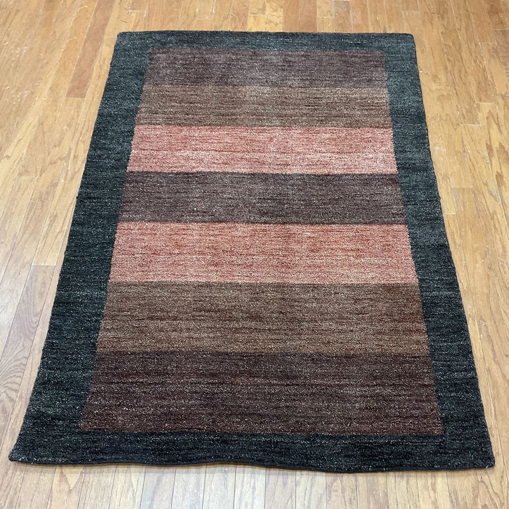 HERAT ORIENTAL Handmade 4' x 6' Dark Border Tibetan Wool Rug - 4' x 6'