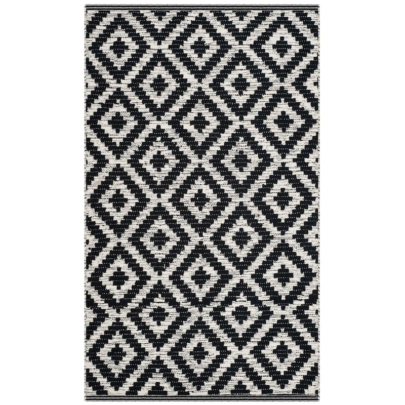 SAFAVIEH Handmade Flatweave Montauk Gulhan Casual Cotton Rug
