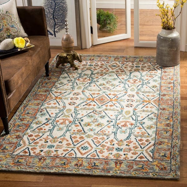 slide 2 of 16, SAFAVIEH Handmade Aspen Neva Boho Tribal Wool Rug