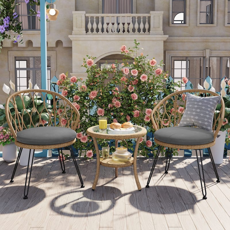 2 Rattan Single Chairs with A Glass Round Table