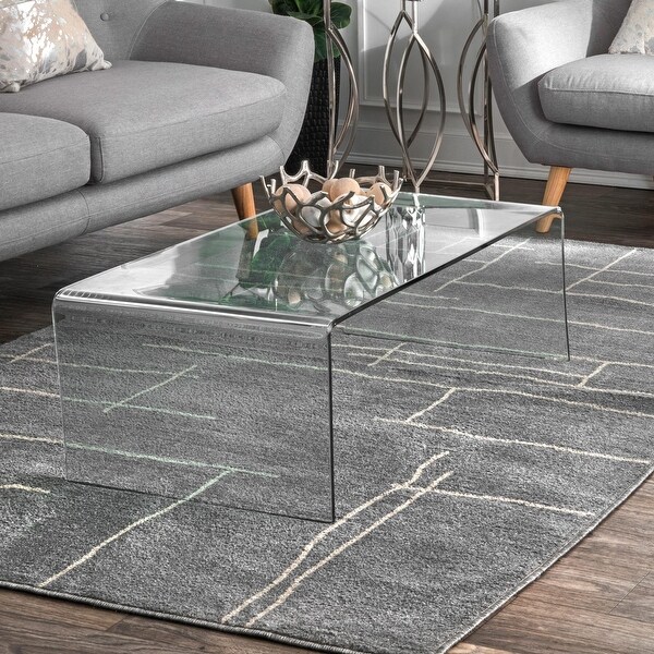 Strick & Bolton Finley Grey Graphic Area Rug. Opens flyout.