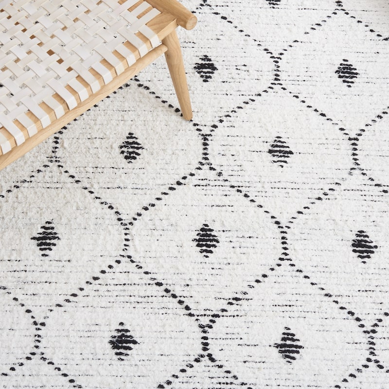 SAFAVIEH Handmade Casablanca Kjellaug Boho Cotton Fringe Rug