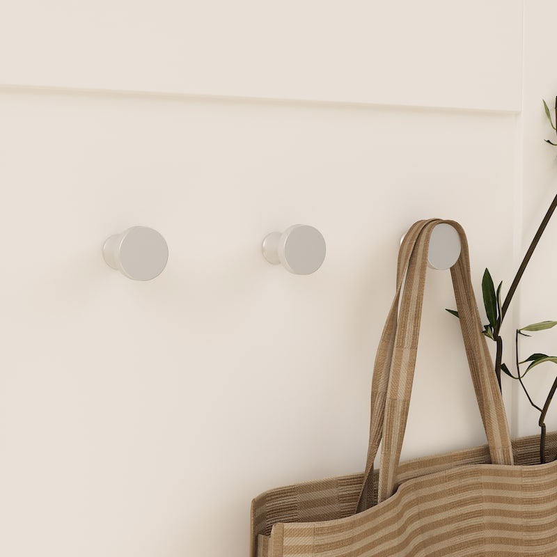 Sleek White Hallway Cabinet with Hooks and Clothes Rod