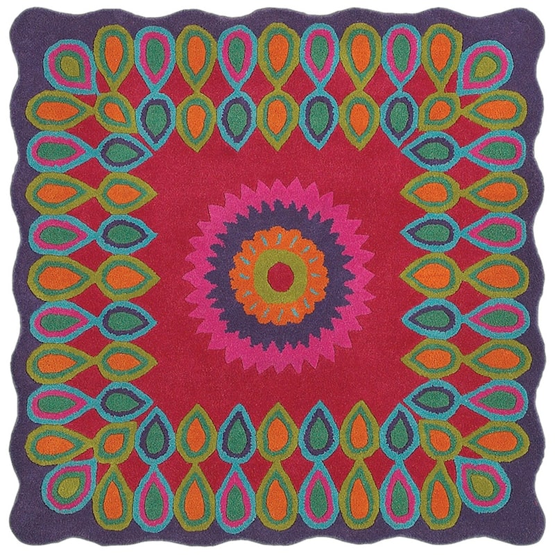Sevita Bursting Peacock Wool Area Rug