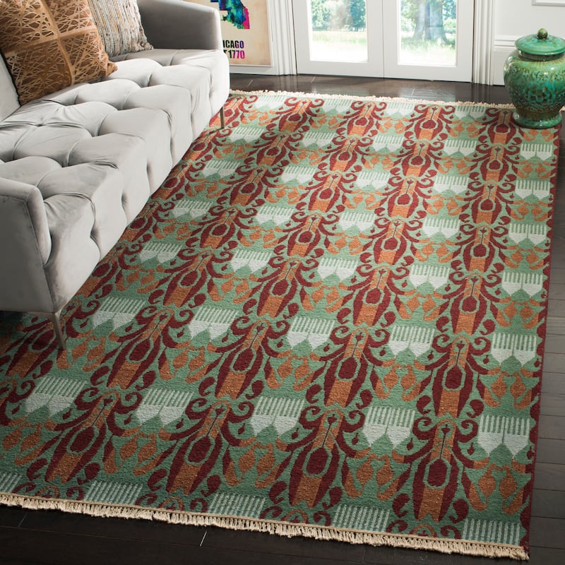 SAFAVIEH Couture Hand-knotted Spelca Modern Wool Rug - 9' x 12' - Sunset Coral