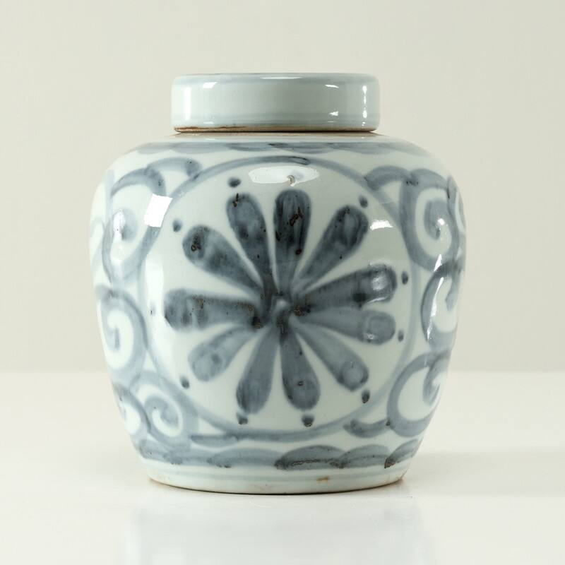 Approx.7 Inches Subtle Blue and White Round Jar with Floral Motif
