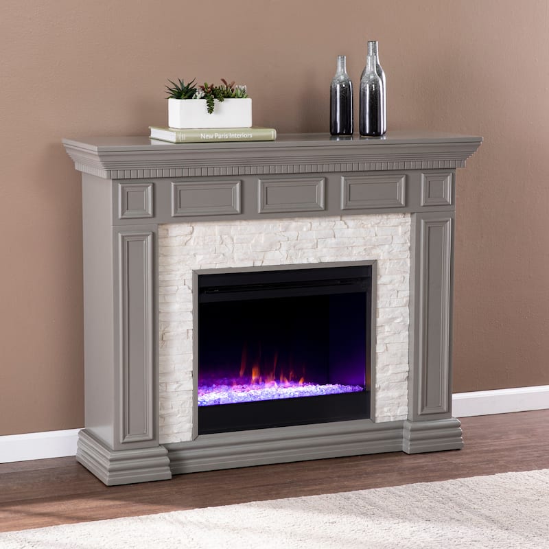 SEI Furniture Derlaro Color Changing Fireplace w/ Faux Stone