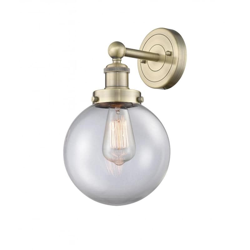 Innovations Lighting 616-1W-10-7-L Beacon Sconce Beacon 10" Tall Wall - Antique Brass / Clear
