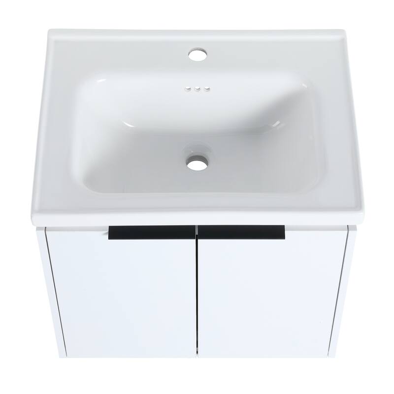 Wall Mounted Bathroom Vanity with Ceramic Basin, Soft Closing Doors, and Metal Handles for Modern Bathroom Storage