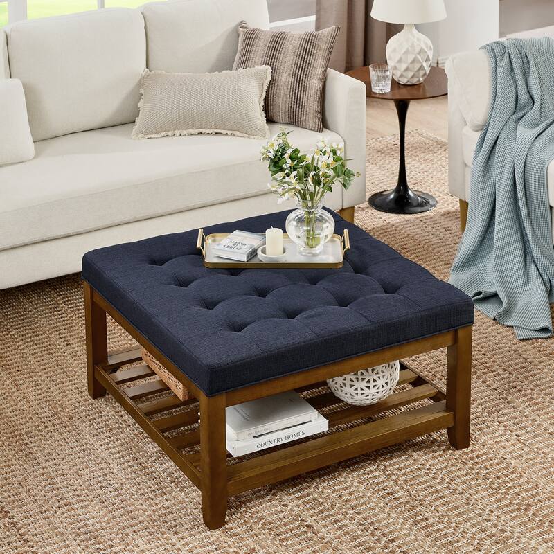 Coffee table with tufted linen upholstery