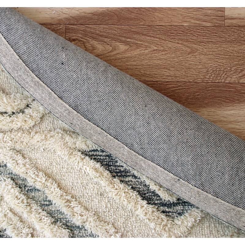 Suino Tribal Geometric Hand-Tufted Wool Round Indoor Area Rug by Sevita