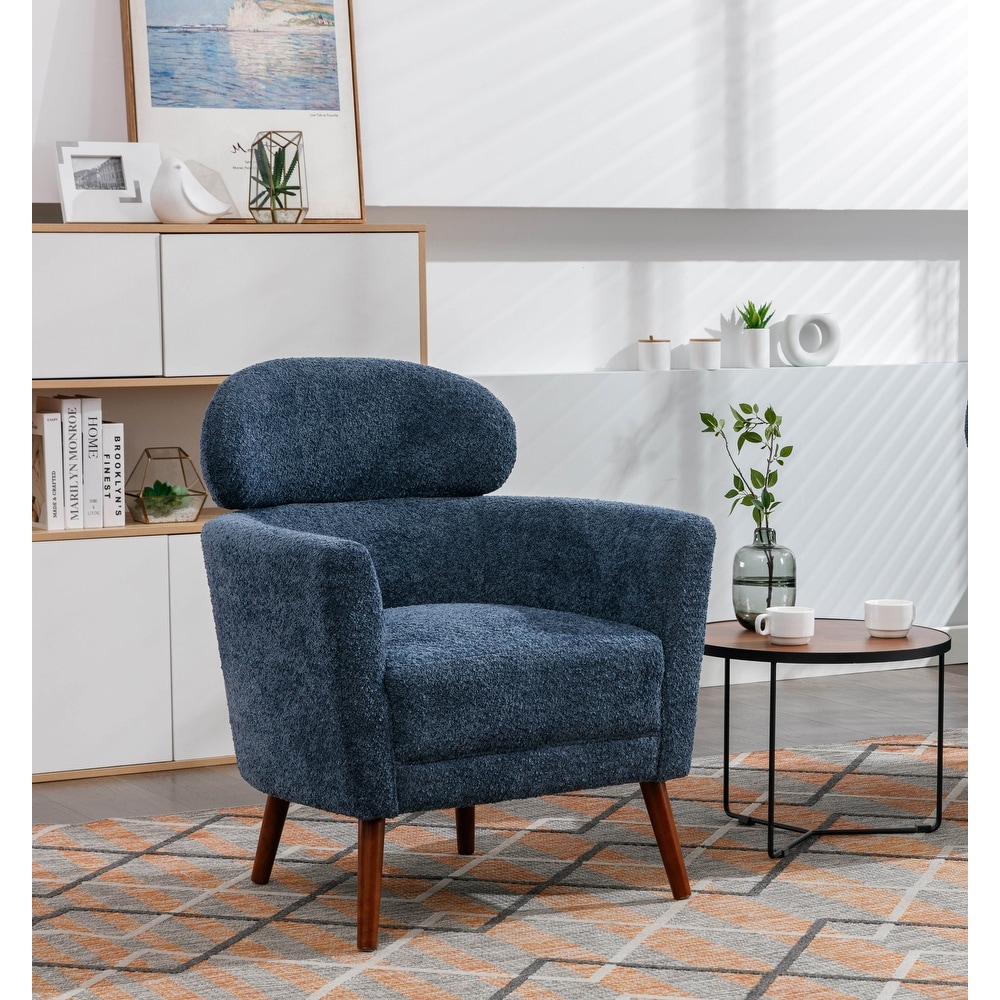 https://ak1.ostkcdn.com/images/products/is/images/direct/8594a5c2a0d6c008ca1e4ae316bfe63be5cddab4/Porthos-Home-Rhys-Sherpa-Fabric-Accent-Barrel-Chair-with-Rubberwood-Legs.jpg