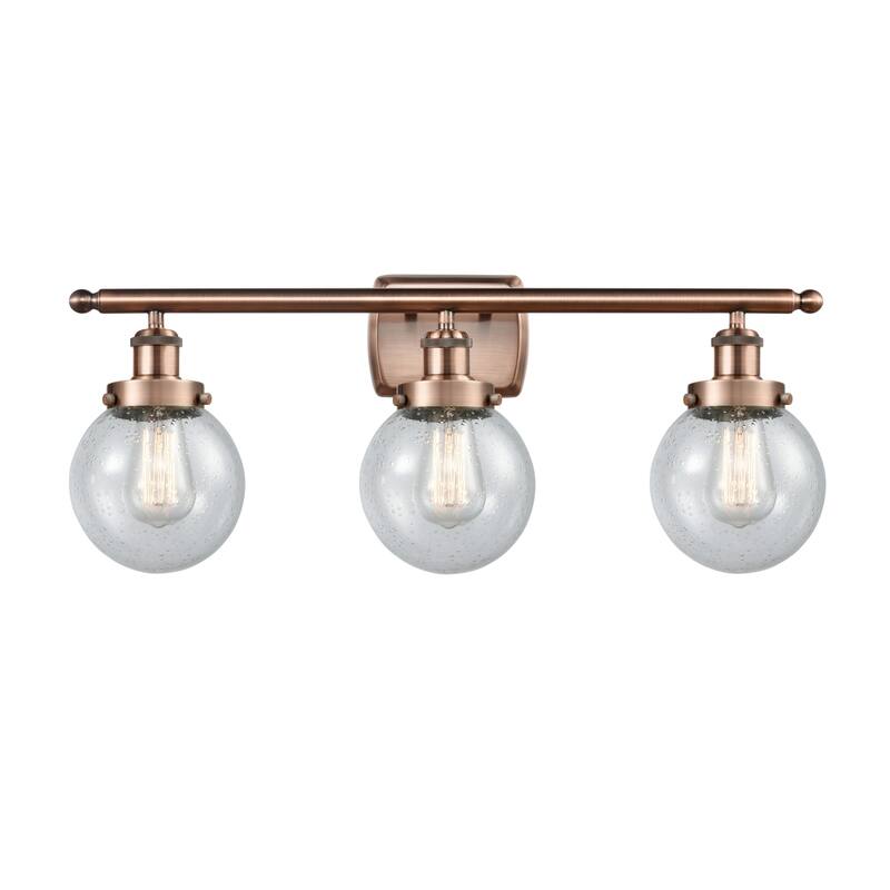 Innovations Lighting 916-3W-11-26 Beacon Vanity Beacon 3 Light 26" - Antique Copper / Seedy