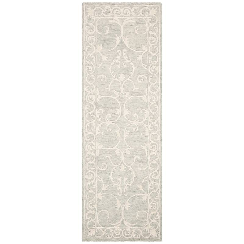 SAFAVIEH Handmade Micro-Loop Tomke Wool Rug