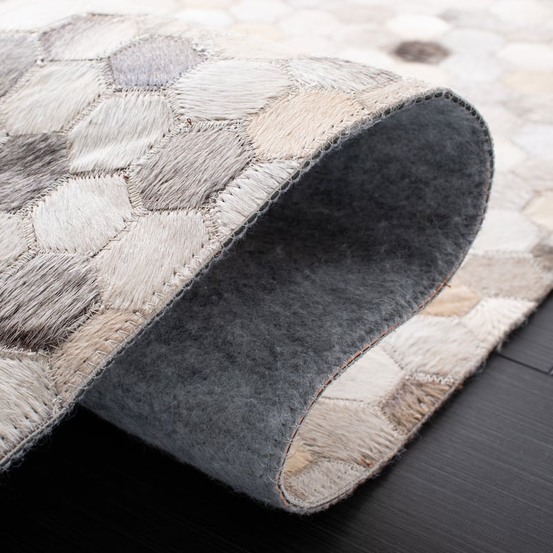 SAFAVIEH Handmade Studio Leather Nadia Modern Leather Rug