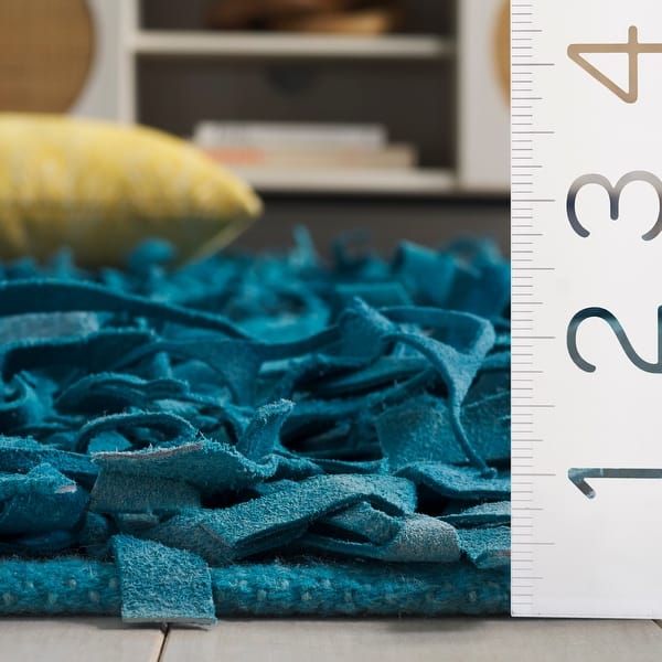 dimension image slide 0 of 2, SAFAVIEH Handmade Leather Shag Carlijn Modern Decorative Rug